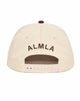 Back view of The Doxie Brown Hat showing brown ALMLA embroidery arched above the adjustable snapback