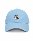 Front view of the Tri-Color Corgi Denim Hat with an embroidered tri-color corgi