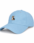 Side angle of The Tri-Color Corgi Denim Hat showing the embroidered corgi and curved denim brim