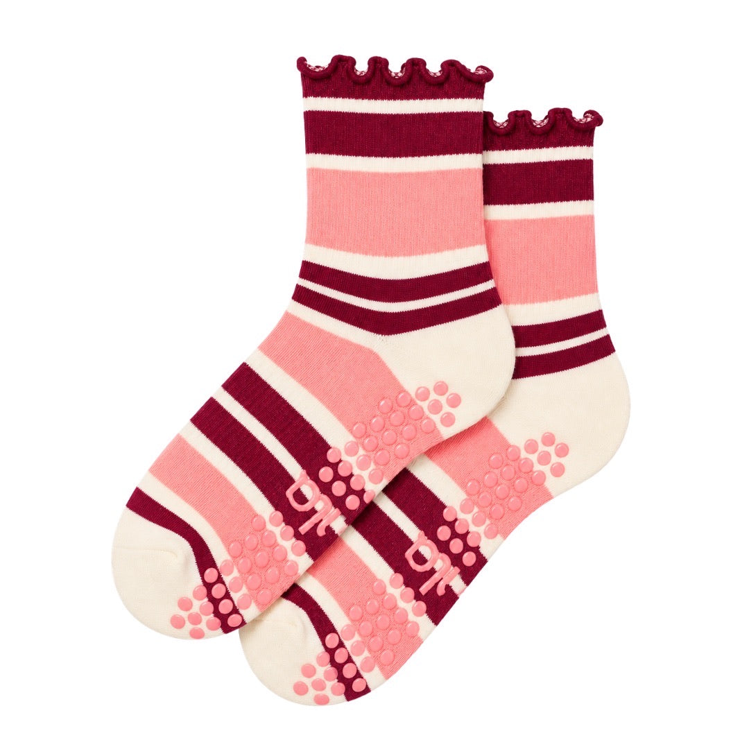Raspberry cream striped grip socks in pink and burgundy with ruffle cuff and non-slip sole