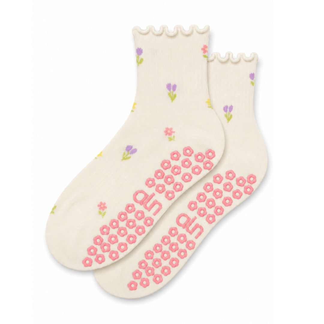 Flower grip socks in cream with multicolor floral print and pink flower-shaped grip sole