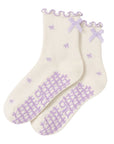 Lavender bow grip socks in cream with purple bow print, ribbon cuff and non-slip sole