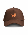 Front view of The Goldendoodle Brown Hat, a rich brown baseball cap with an embroidered goldendoodle
