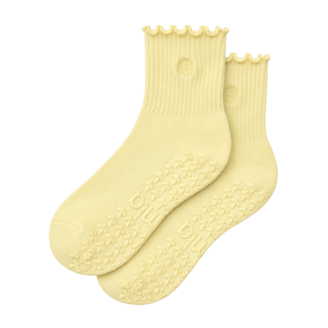 Butter yellow grip socks, ribbed crew with ruffle cuff and non-slip flower grip sole